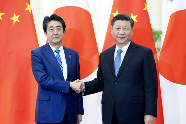 习近平会见日本首相安倍晋三.jpg