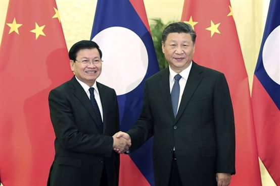 C:UsersdellDesktop习近平会见老挝总理通论.jpg